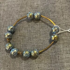 Elegant Gold and Silver Beaded Bracelet